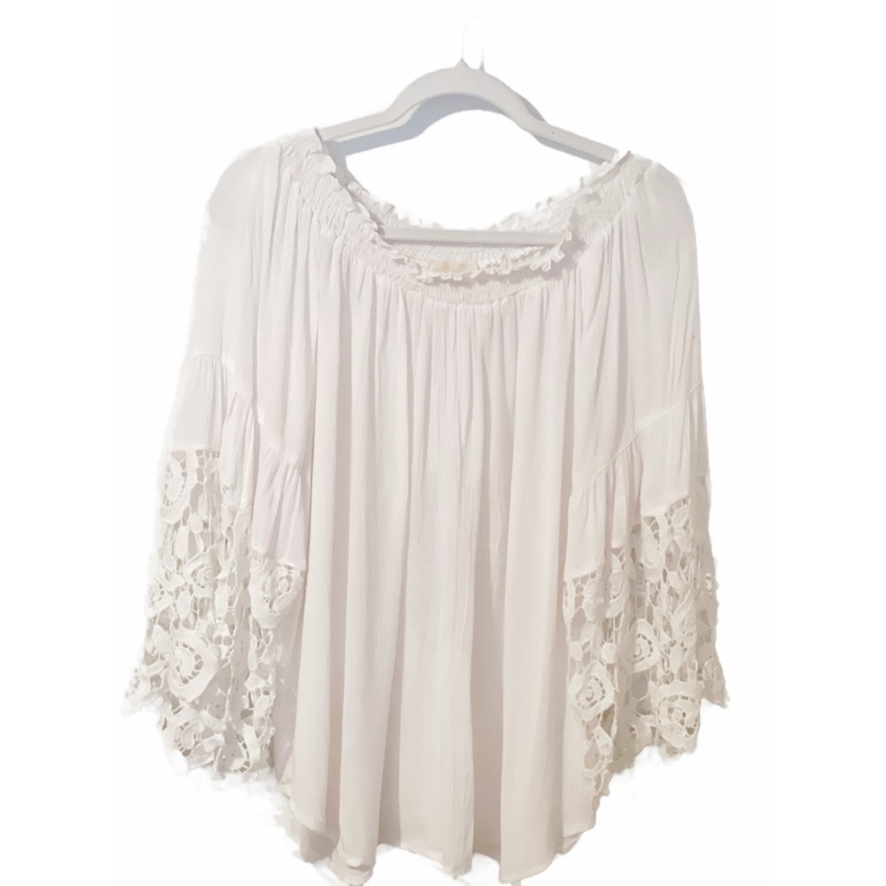 White Ruffled Bell Sleeve Blouse
